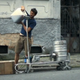 Illustration for article titled Watch a Designer Turn Soda Cans Into Stools on a São Paulo Street